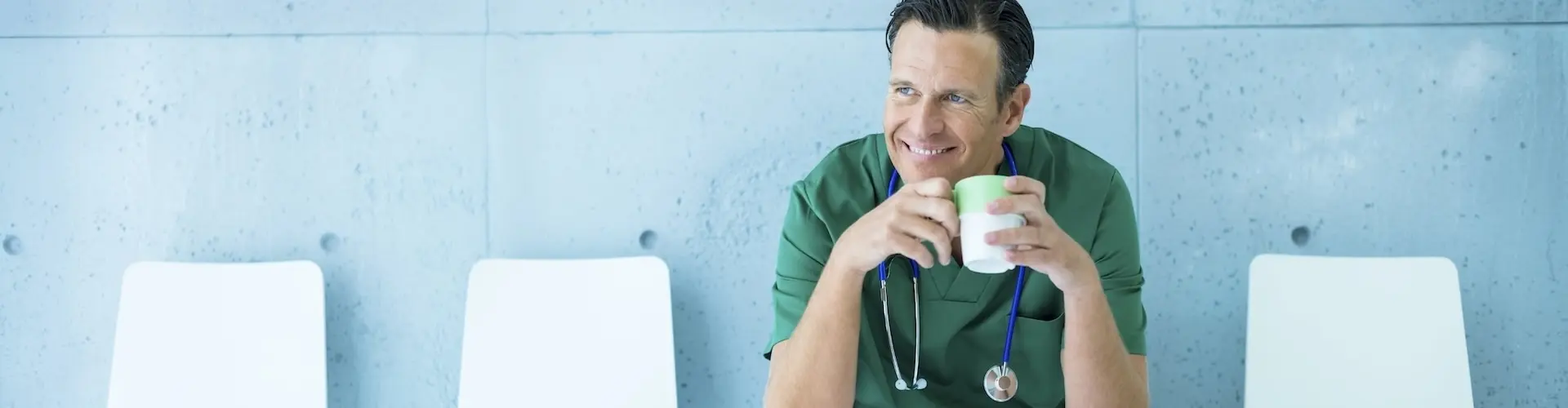 Doctor sitting in a hospital corridor