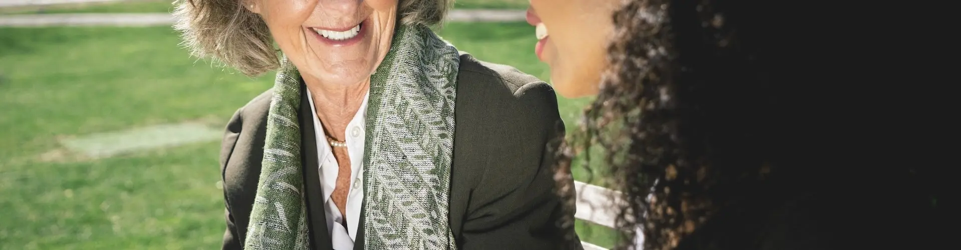 Care Assistant talking with care home resident