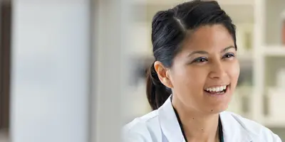 A Pharmacist talking to a customer