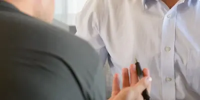 Pharmacy Technician talking to a colleague