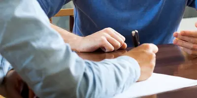 Occupational Therapist talking to a colleague