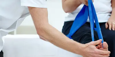 Physiotherapist working with a patient